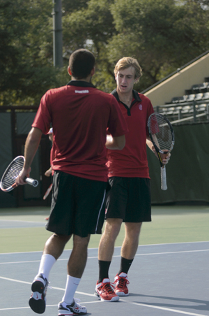 Matt Kandath (left), John Morrissey and the rest of the Stanford men's tennis team won two of three matches at the National Team Indoor Championships. (NICK SALAZAR/The Stanford Daily)