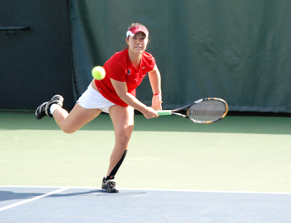 Sophomore Kristie Ahn (above) and her partner, senior Veronica Li, won their doubles match against USF, 8-3, aiding No. 11 Stanford to a 7-0 sweep over the Dons. The Cardinal next faces No. 7 Cal this Friday. (MADELINE SIDES/The Stanford Daily)