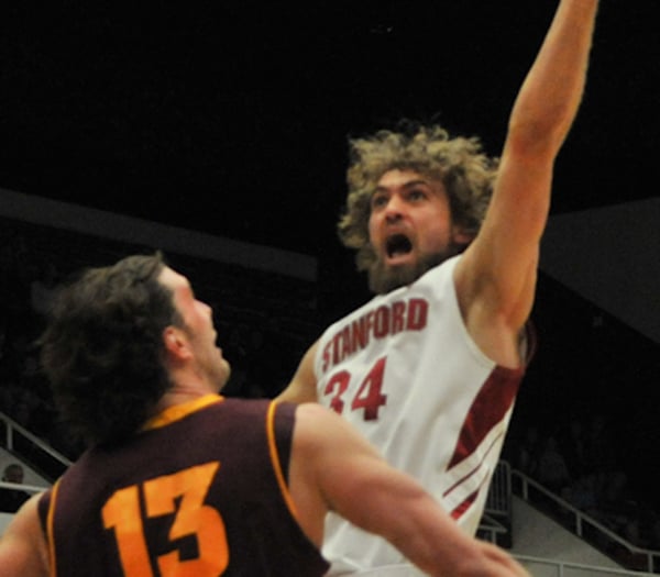 Senior forward Andrew Zimmermann (right) had one of the best games of his Stanford career in his last regular-season contest at Maples Pavilion. Though Zimmermann's 13 points fell one short of his career-high, he was a constant thorn in the Golden Bears' side, playing the entire second half with three fouls but staying out of trouble late in the game. (MIKE KHEIR/The Stanford Daily)