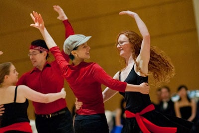 Stanford Ceili performs a set. The official uniform of the group is a red shirt and black pants for the men and all black for the women. This is a result of what the group members had at hand during their first performance. (Courtesy of Jason Chuang)