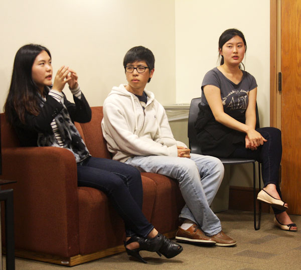 Students spoke with a member of the Youth Defectors' Alliance for North Korean Human Rights in EAST House Thursday night. The discussion was a precursor event to a panel Friday with three Korean defectors titled, 'A Story of Survivors: The Lives of North Korean Youth Defectors.' (ALISA ROYER/The Stanford Daily)
