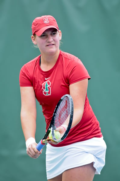 Junior Mallory Burdette (above) and the Stanford women's tennis team have a crucial weekend coming up as the Cardinal hosts No. 1 UCLA and No. 4 USC with Pac-12 and national supremacy at stake. (SIMON WARBY/The Stanford Daily)