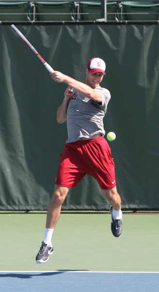 Senior Ryan Thacher closed out his regular-season career for Stanford on a high note, battling back from a first-set loss to win his singles match 3-6, 6-1, 6-4 and clinch the Cardinal's win at Cal. (ALISA ROYER/The Stanford Daily)