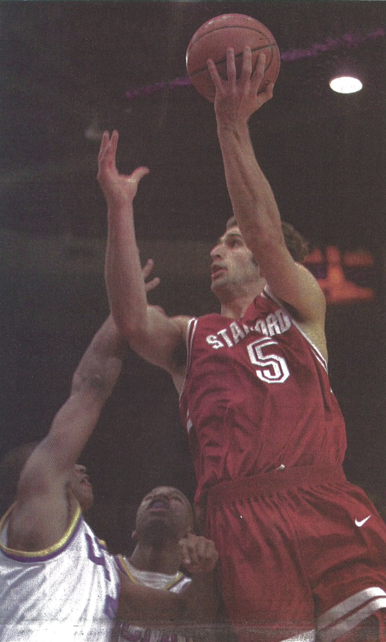 Former Cardinal forward Peter Sauer, pictured here in a Jan. 16, 1999 game against UCLA, died on Sunday when he collapsed and hit his head after a recreational-league game. Sauer had a wife and three kinds. (REUTERS)