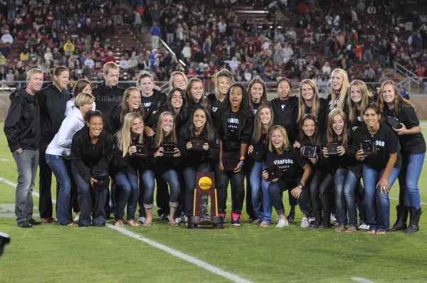 The No. 5 Stanford women's soccer team was honored at halftime of Saturday's football game for its 2011 national title, but more importantly for head coach Paul Ratcliffe and Co., the squad won both of its games this weekend. (SIMON WARBY/The Stanford Daily)