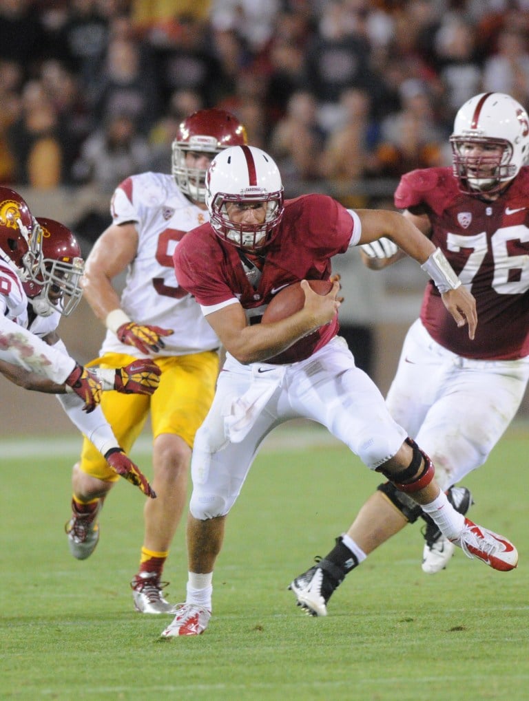 Redshirt junior quarterback Josh Nunes first showed off his legs in upsetting No. 2 USC on Sept. 25, but those skills came in handy again last Saturday when he rushed for three touchdowns in a comeback win against Arizona. Nunes was named Pac-12 Offensive Player of the Week on Monday for his five overall touchdowns and 360 passing yards. (SIMON WARBY/The Stanford Daily)