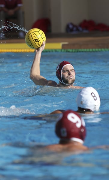 Redshirt junior Forrest Watkins (above with ball) and the No. 5 men's water polo team face must-win games this weekend against UC-Santa Barbara and Pepperdine (LARRY GE/The Stanford Daily).