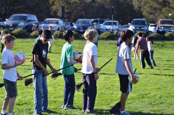Students learn to play Quidditch, the fantastical sport in the popular Harry Potter series, during one of 255 classes offered by Stanford Splash this past weekend. (Courtesy of Michael Shaw)