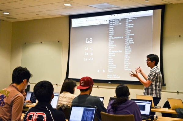 Students in Cardinal WebDev's winter quarter course on web design listen to a lecture given by Kevin Xu '13, one of the three student leaders of the class. 200 students wanted to take the class, which was capped at 40. (KATIE BRIGHAM/The Stanford Daily)