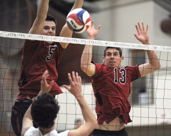Juniors Brian Cook (left) and Eric Mochalski (right) played important roles in Stanford's thrilling comeback win against Pacific on Saturday. Cook led the team with a match-high 24 kills, and Mochalski chipped in with 10 kills and five blocks as the Cardinal beat the Tigers 3-2. (MICHAEL KHEIR/The Stanford Daily)
