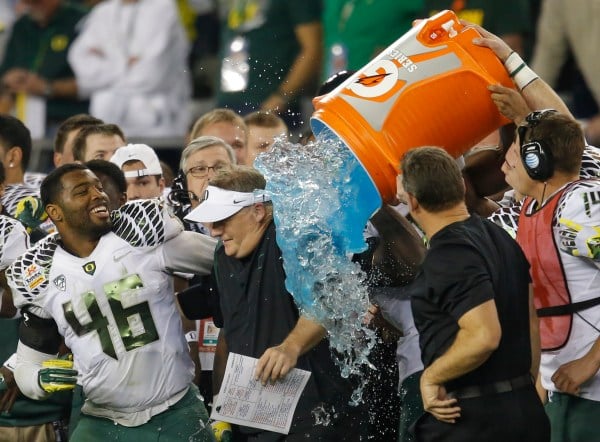 Oregon players shower head coach Chip Kelly in gatorade after the team's Fiesta Bowl victory on January 3, 2013.