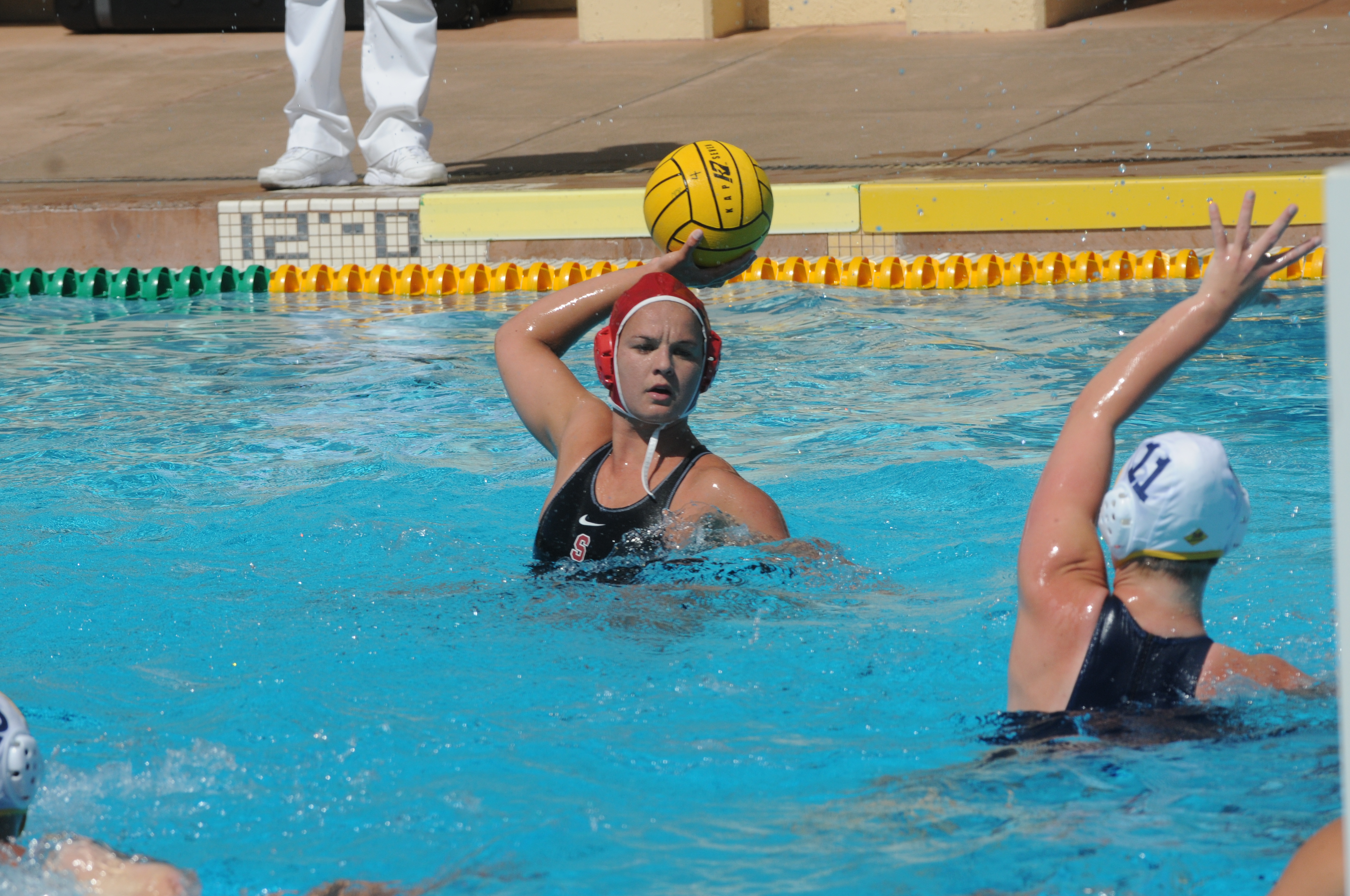Already off to a perfect 5-0 start, the women's water polo team and sophomore star Kiley Neushal (above with ball) are aiming higher in hopes of a third consecutive national championship this year (Stanford Daily File Photo)