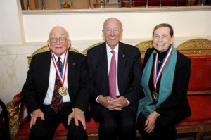 Sidney Drell and Lucy Shapiro sit with George Shultz after receiving the National Medal of Science. [Courtesy of Susan Schendel]
