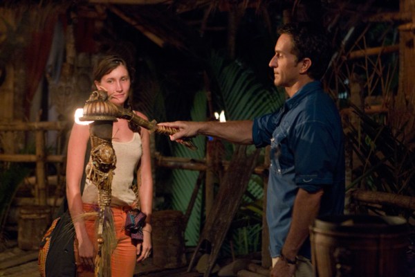 Jeff Probst extinguishes Julia Landauer's torch and becomes the next evicted survivor at Tribal Council during the seventh episode of "Survivor: Caramoan" last Wednesday, March 27. (Courtesy of CBS)
