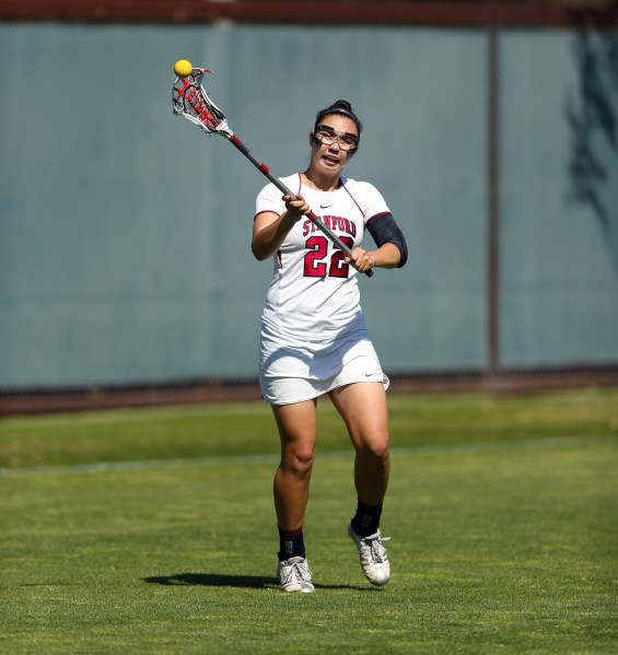 Freshman Julia Burns (above) had three goals, but it wasn't enough for the Cardinal, whose season ended with a 15-8 loss to No. 2 Northwestern. (HECTOR GARCIA-MOLINA/stanfordphoto.com)