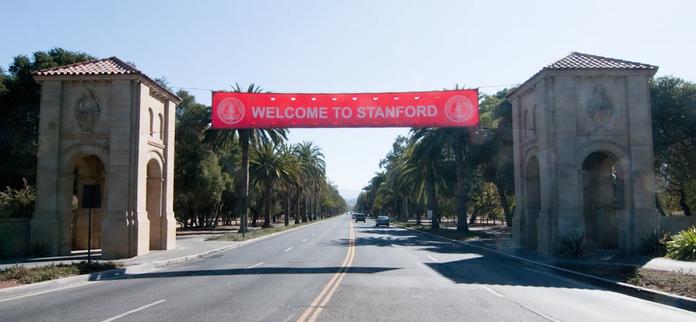'Welcome to Stanford' banner hangs at entrance to Palm Drive.