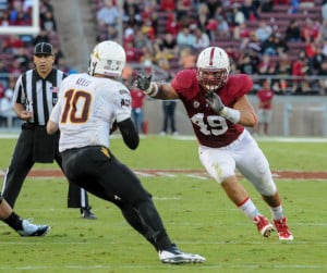 Fifth-year senior defensive end Ben Gardner (49) blocked a punt to help Stanford put the Sun Devils away Saturday. (SIMON WARBY/The Stanford Daily)