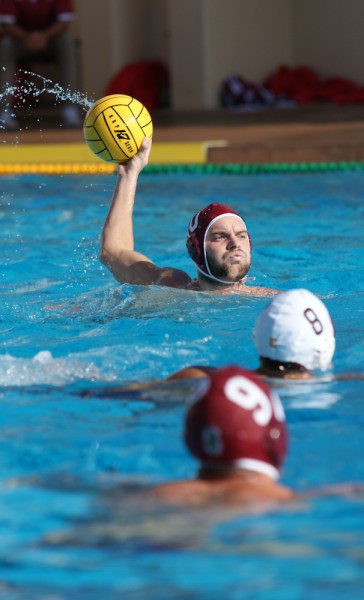 Fifth year senior Forrest Watkins (top) tallied five goals during Sunday's match, keeping the Cardinal close in the final period. (LARRY GE/The Stanford Daily)