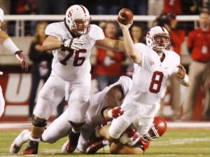 Junior quarterback Kevin Hogan (8) was unable to convert third and fourth down passing attempts on Stanford's final drive, sealing his team's 27-21 defeat. (ISIPhotos.com)