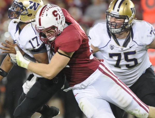 Trent Murphy (above) leads the Cardinal, and is third in the nation, with 9.5 sacks on the season. (SIMON WARBY/The Stanford Daily)