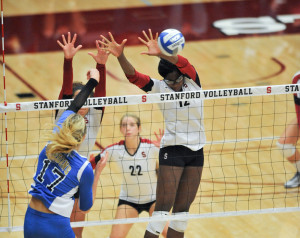 Inky Ajanaku (right) powered Stanford's victory over UCLA with 10 kills on the night. (ZETONG LI/The Stanford Daily)