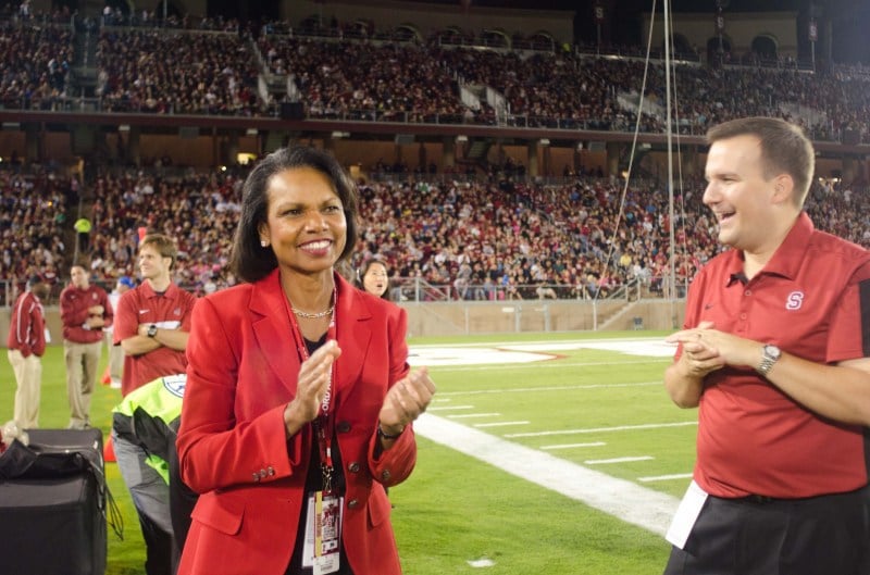 Condoleezza Rice (left) and the rest of the College Football Playoff selection committee would be hard-pressed to choose between No. 4 Michigan State and No. 5 Stanford if the new postseason system was in place this year. (DANI VERNON/StanfordPhoto.com)