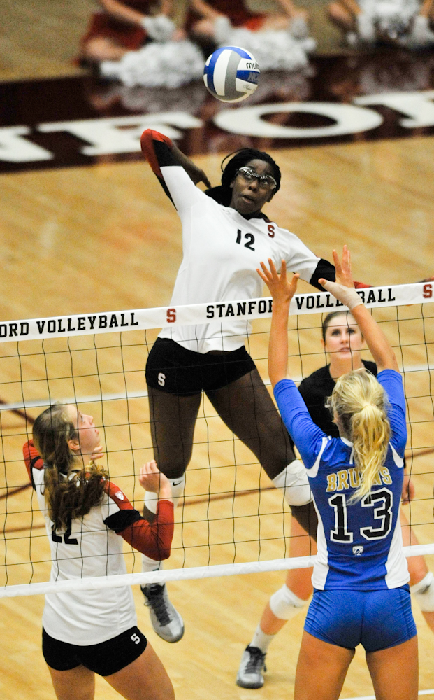 Sophomore middle blocker Inky Ajanaku (12)—who was selected as the Pac-12 Offensive Player of the Week for the last week of November — has been a key anchor of the Cardinal offense, averaging 3.1 kills per set and a .465 hitting percentage over the last nine games. (ZETONG LI/The Stanford Daily).