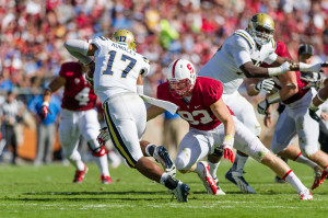 Trent Murphy (93) leads the nation with 14 sacks, 1½ more than any other player. (Jim Shorin/Stanfordphoto.com)