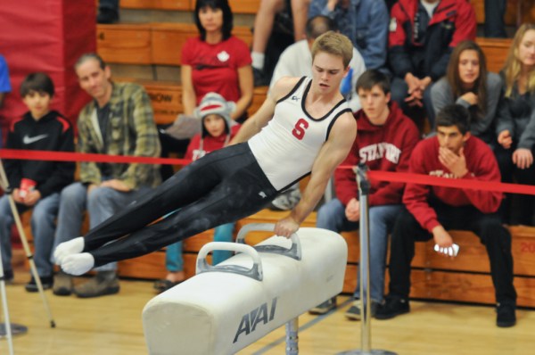 Stanford senior Mike Turner (above) has begun the season with two straight titles in the pommel horse. (SIMON WARBY/The Stanford Daily)