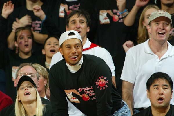 Tiger Woods (center) and his then-fiancée, Elin Nordegren (bottom left), sat courtside for the game. (DAVID GONZALES/Stanford Athletics)