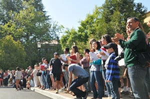 Prospective freshmen and their families revel in the Stanford Band's antics in front of Memorial Auditorium. (ZETONG LI/The Stanford Daily)
