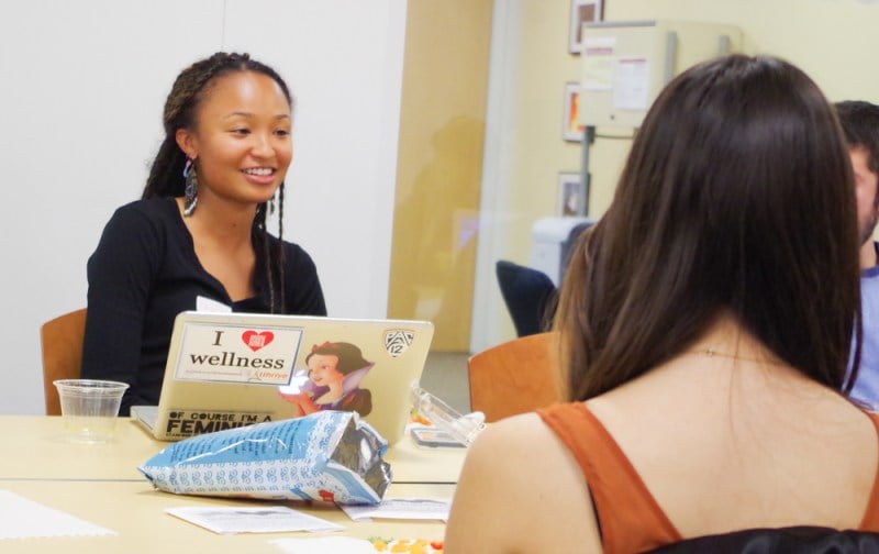Taylor Dewberry '14 speaks to a student during “Diversity Office Hours.” (Sam Girvin|The Stanford Daily)