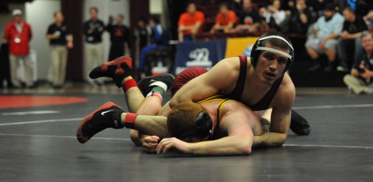 Stanford's Jim Wilson (right) was named the Pac-12 Wrestling Freshman/Newcomer of the Year after a season that saw him compile a 35-8 record. (SAM GIRVIN/The Stanford Daily)