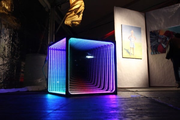 "Box of Stars" (above), by graduate student Cooper Newby, is composed of lights and mirrors. Festival attendees can experience three-dimensional space within two-dimensional frames. (Courtesy of Cooper Newby)