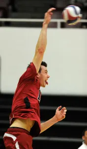 Senior outside hitter Brian Cook (above) extended his collegiate career with the decisive kill in Stanford's five-set win against BYU in the national semifinal Thursday night. (MIKE KHEIR/The Stanford Daily)