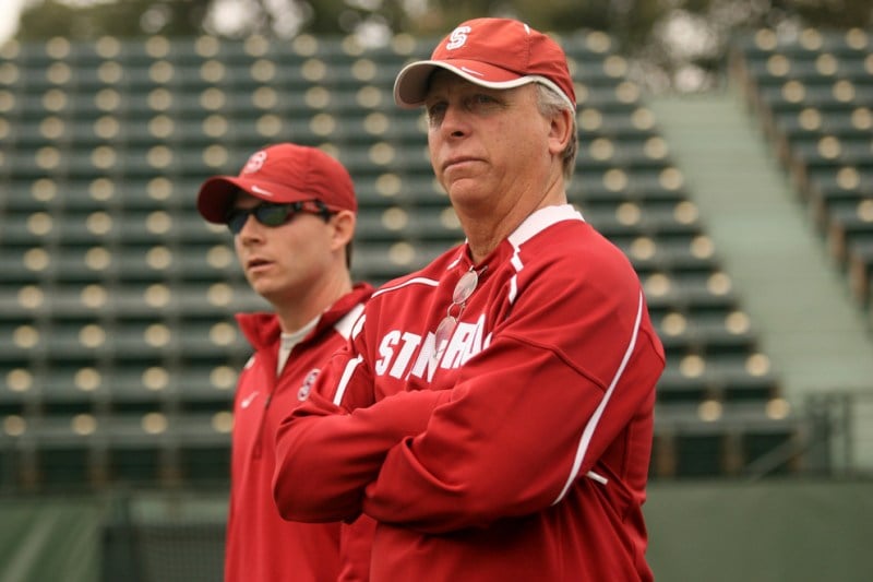 John Whitlinger (right) retired Thursday as Stanford's Men's Tennis coach after a 10-year run leading the program. During this stretch, Whitlinger compiled a .867 winning percentage, and helped the Cardinal notch eight consecutive postseason appearances. (DAVID GONZALES/ The Stanford Daily)