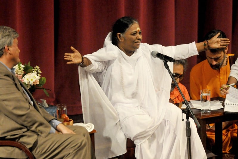 On June 2, 60-year-old Amma shared her life experiences and insights with a packed Memorial Auditorium. (ZETONG LI/The Stanford Daily)