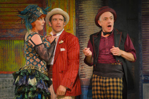 (l to r) Patty Gallagher as the Courtesan, Adrian Danzig as Antipholus, and Danny Scheie as Dromio in Cal Shakes’ THE COMEDY OF ERRORS, directed by Aaron Posner; photo by Kevin Berne.