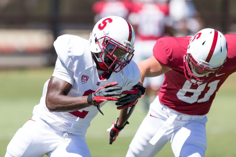 Stanford and senior corner Wayne Lyons (left) hope to get off to a running start on the season this Saturday against UC-Davis. (TRI NGUYEN/The Stanford Daily)