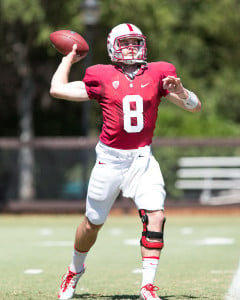 Senior Kevin Hogan (8) leads an experienced Cardinal squad that hopes to reach the first ever College Football Playoff this season. (TRI NGUYEN/The Stanford Daily)