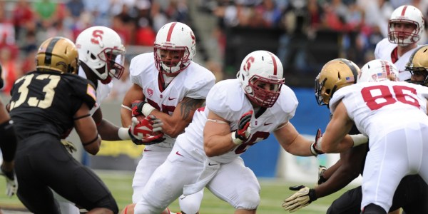Fifth-year senior Lee Ward (fourth from left) has already proven himself as a hard-nosed run-blocker, but he and senior Patrick Skov are looking to become more complete fullbacks in 2014. (GIL TALBOT/StanfordPhoto.com)