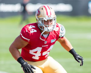 Shayne Skov '14 (above) is fighting for a roster spot after shockingly going undrafted in the 2014 NFL Draft. Despite playing under coach Harbaugh at Stanford, Skov feels that he is not entitled to a spot on the team. (TRI NGYUEN/The Stanford Daily)
