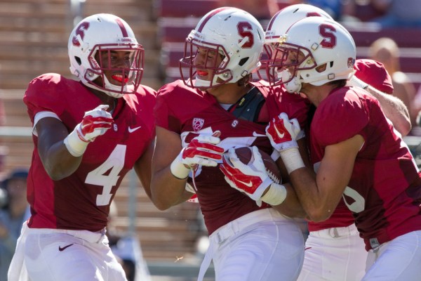 Stanford's sophomore trio of tight ends, including Austin Hooper (center), could be the key to improved red-zone efficiency against USC. (BOB DREBIN/stanfordphoto.com)