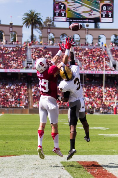 Senior wideout Devon Cajuste (left) had three touchdowns in Stanford's 35-0 victory against Army. Cajuste, who had four receptions for 52 yards against the Black Knights, set a new career high for number of TD receptions in a game.(ROGER CHEN/The Stanford Daily)