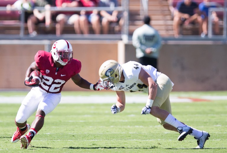 Senior running back Remound Wright (left) rushed for a touchdown against Notre Dame but was part of a lackluster rushing effort that was only able to muster 47 yards on the ground, the lowest mark since a 2007 game against Oregon State. (FRANK CHEN/The Stanford Daily)