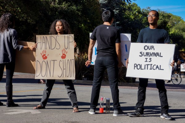 Monday afternoon, student protesters surrounded the Circle of Death and urged bikers to "slow down for Michael Brown."
(KRISTEN STIPANOV/The Stanford Daily)
