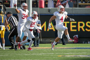 Senior inside linebacker Blake Martinez (right) had a career day, forcing a fumble and intercepting Cal quarterback Jared Goff twice while leading all defenders with 11 tackles. (BOB DREBIN/stanfordphoto.com)
