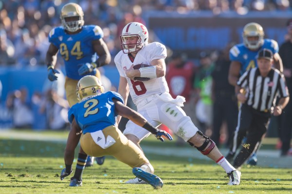 Senior quarterback Kevin Hogan (center) had the best game of his career to lead the Cardinal to a resounding upset of the No. 8 Bruins, going 16-of-19 for an incredibly efficient 234 yards and two touchdowns. (DAVID BERNAL/isiphotos.com)