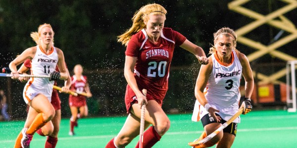 Junior attacker Lauren Becker (center) and the No. 4 Stanford field hockey team qualified for the program's 13th all-time NCAA tournament appearance and will face No. 8 Louisville on Saturday. (NATHAN STAFFA/The Stanford Daily)