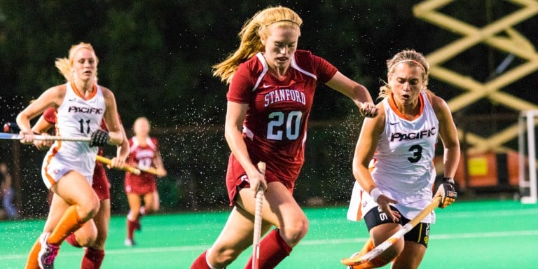 Junior attacker Lauren Becker (center) and the No. 4 Stanford field hockey team qualified for the program's 13th all-time NCAA tournament appearance and will face No. 8 Louisville on Saturday. (NATHAN STAFFA/The Stanford Daily)